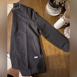 Not approved scrub color. Received from family member and let hang in closet.